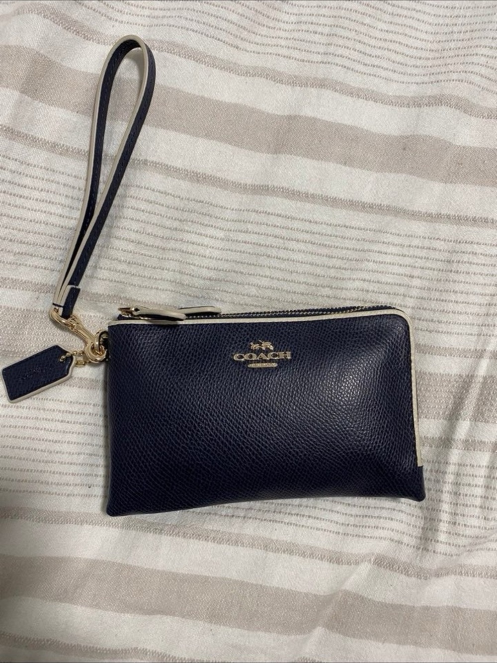 Coach Navy Pebbled Leather Wristlet with Gold Hardware